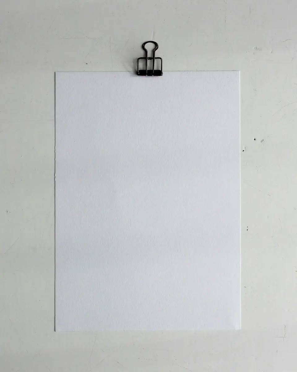 A Kiez Cycles poster clipped to a white wall